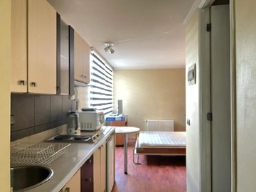 Departamento en arriendo mensual en Moneda 1576, Santiago - 1 dormitorio, 1 baño