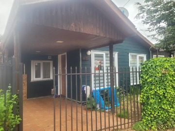 Casa Regularizada con Patio y Taller Image