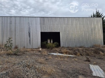 Terreno Industrial en arriendo mensual en Gran Galpón Industrial con Amplio Terreno y Acceso para Camiones, Puente Alto