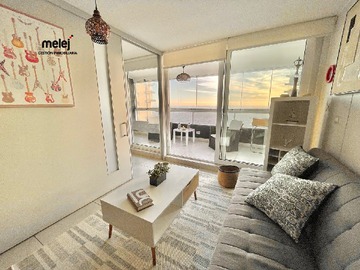 Living con salida a terraza