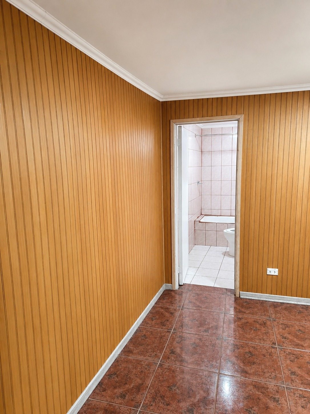 Dormitorio con baño