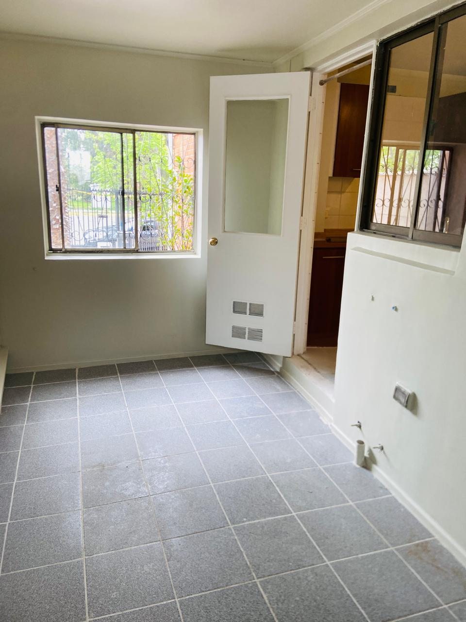 Logia/lavanderia vista cocina