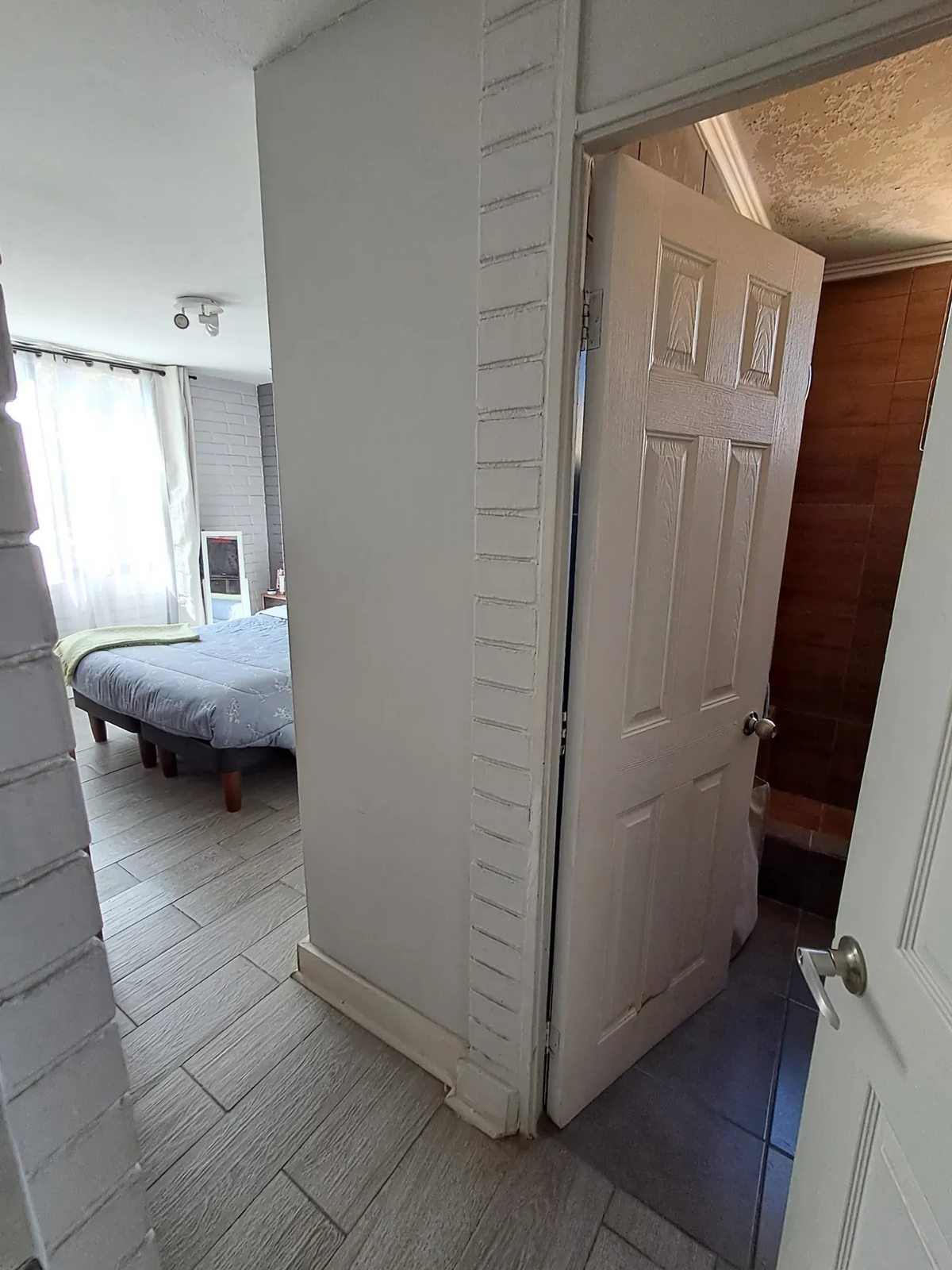 Dormitorio principal con baño en suite