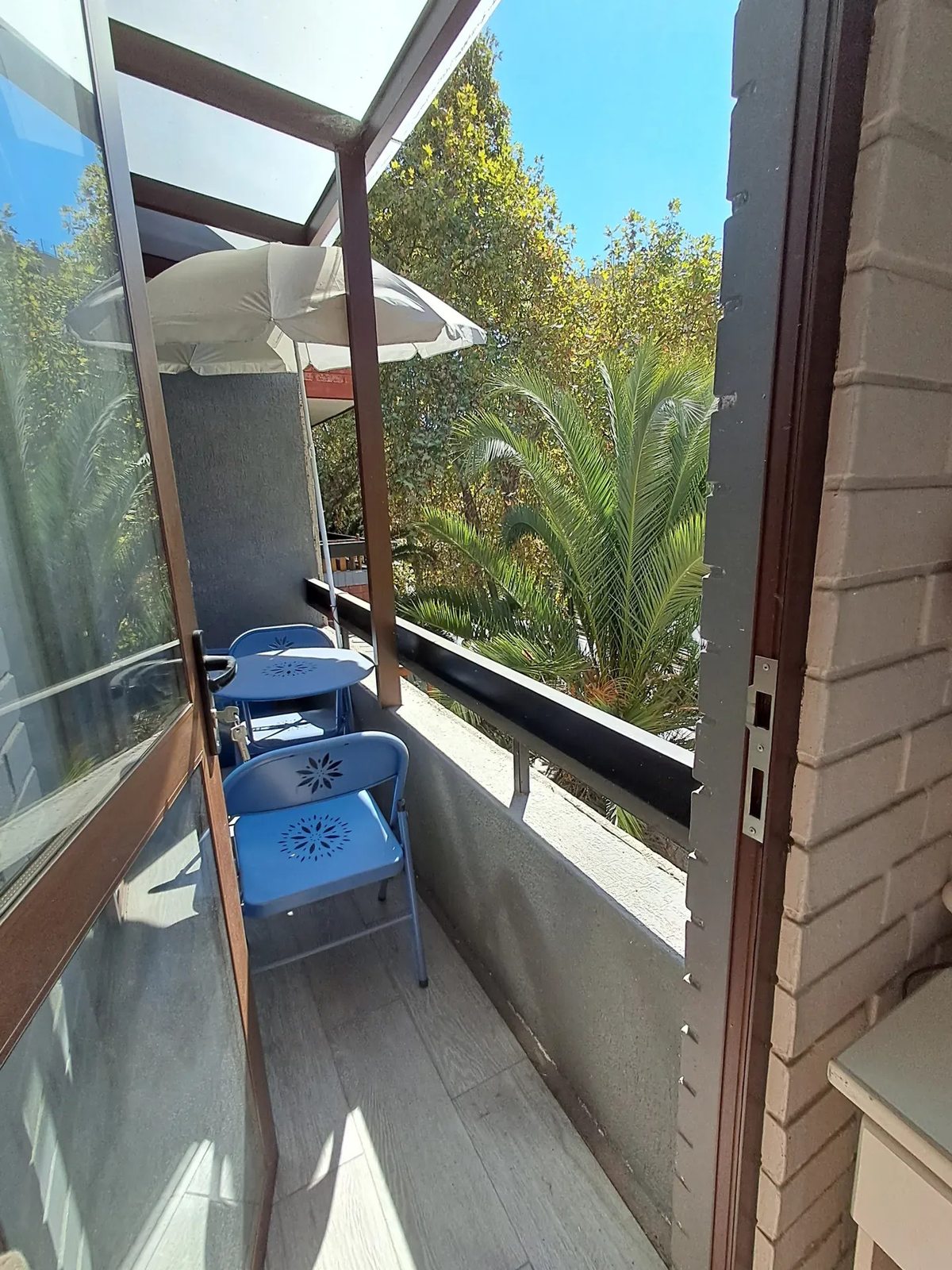 Terraza techada termmopanel compartida por 2 dormitorios