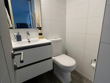 Baño visita