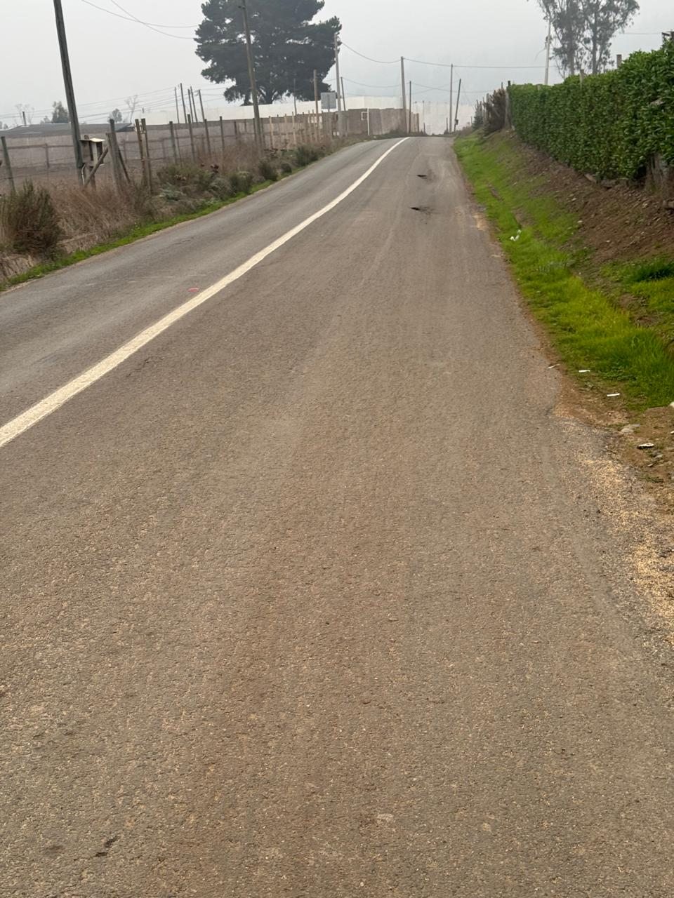 FRENTE A CAMINO PAVIMENTADO